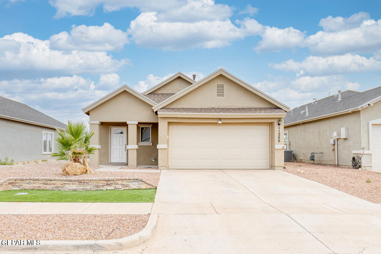 11288 Santa Barbara Socorro, TX 79927 - Photo 1 of 31 a front view of a house with a outdoor space