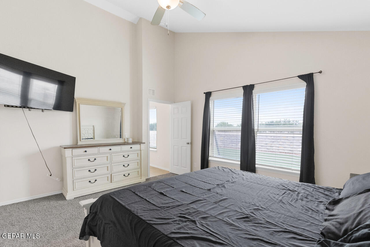 11288 Santa Barbara Socorro, TX 79927 - Photo 16 of 31 a bedroom with a bed and a window