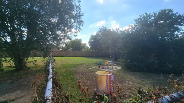 a view of a garden with an outdoor space