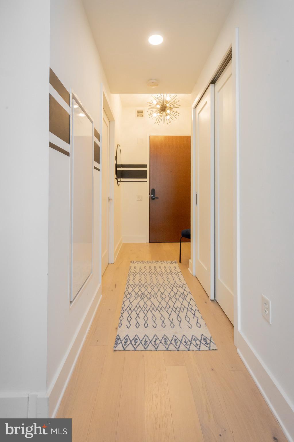 1211 Van Street Southeast, Unit 1210 Washington, DC 20003 - Photo 2 of 42 a bathroom with a shower and a tub