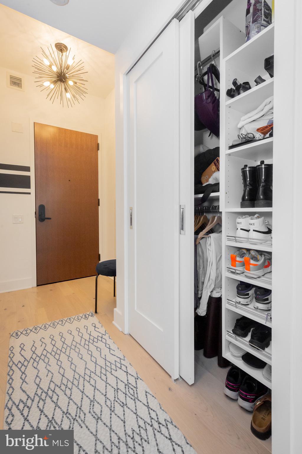 1211 Van Street Southeast, Unit 1210 Washington, DC 20003 - Photo 4 of 42 a bedroom with a bed and closet