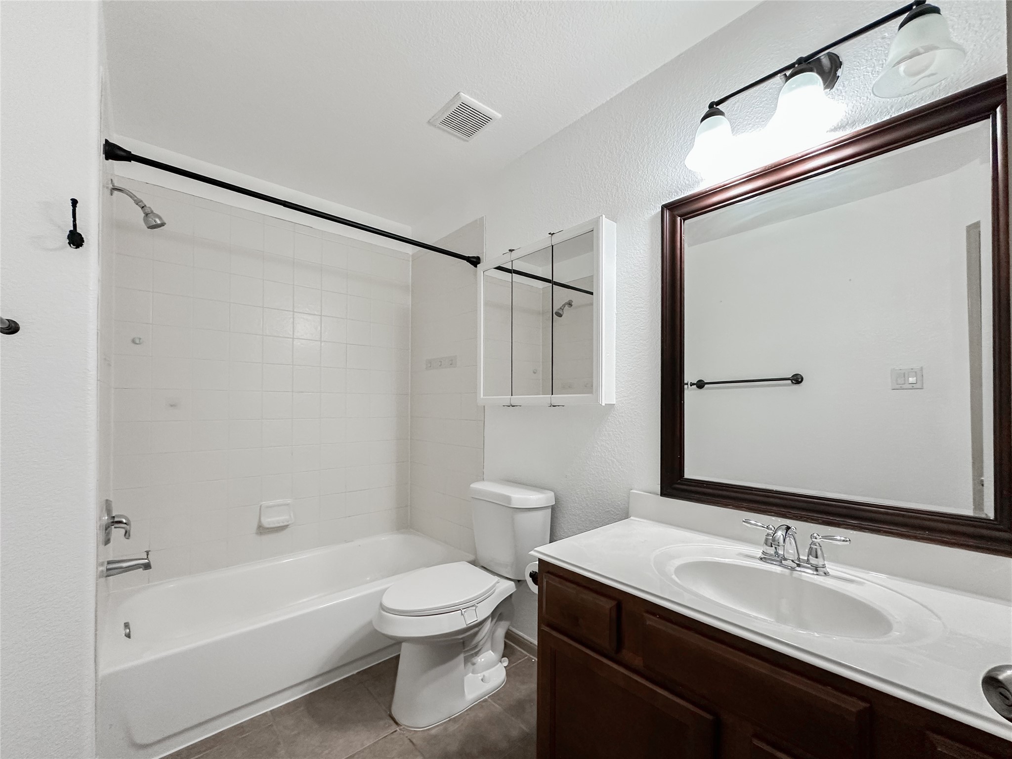 20319 Little Wing Drive Spring, TX 77388 - Photo 39 of 49 a bathroom with a sink a toilet and shower