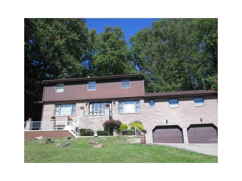 1553 Buffenmeyer Road Latrobe, PA 15650 - Photo 3 of 25 Exterior Front. Two car garage and ample parking will accommodate all your family & guests.