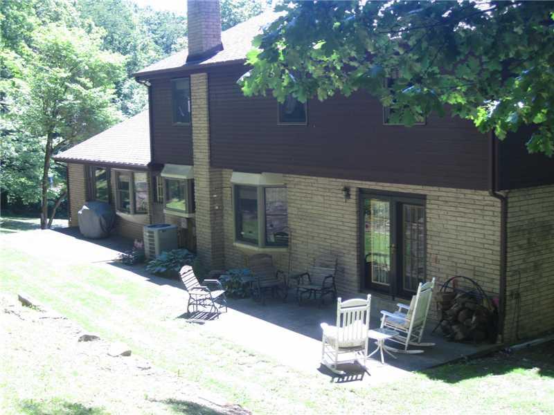 1553 Buffenmeyer Road Latrobe, PA 15650 - Photo 24 of 25 Exterior Back. Relax in the privacy of the shaded back patio.