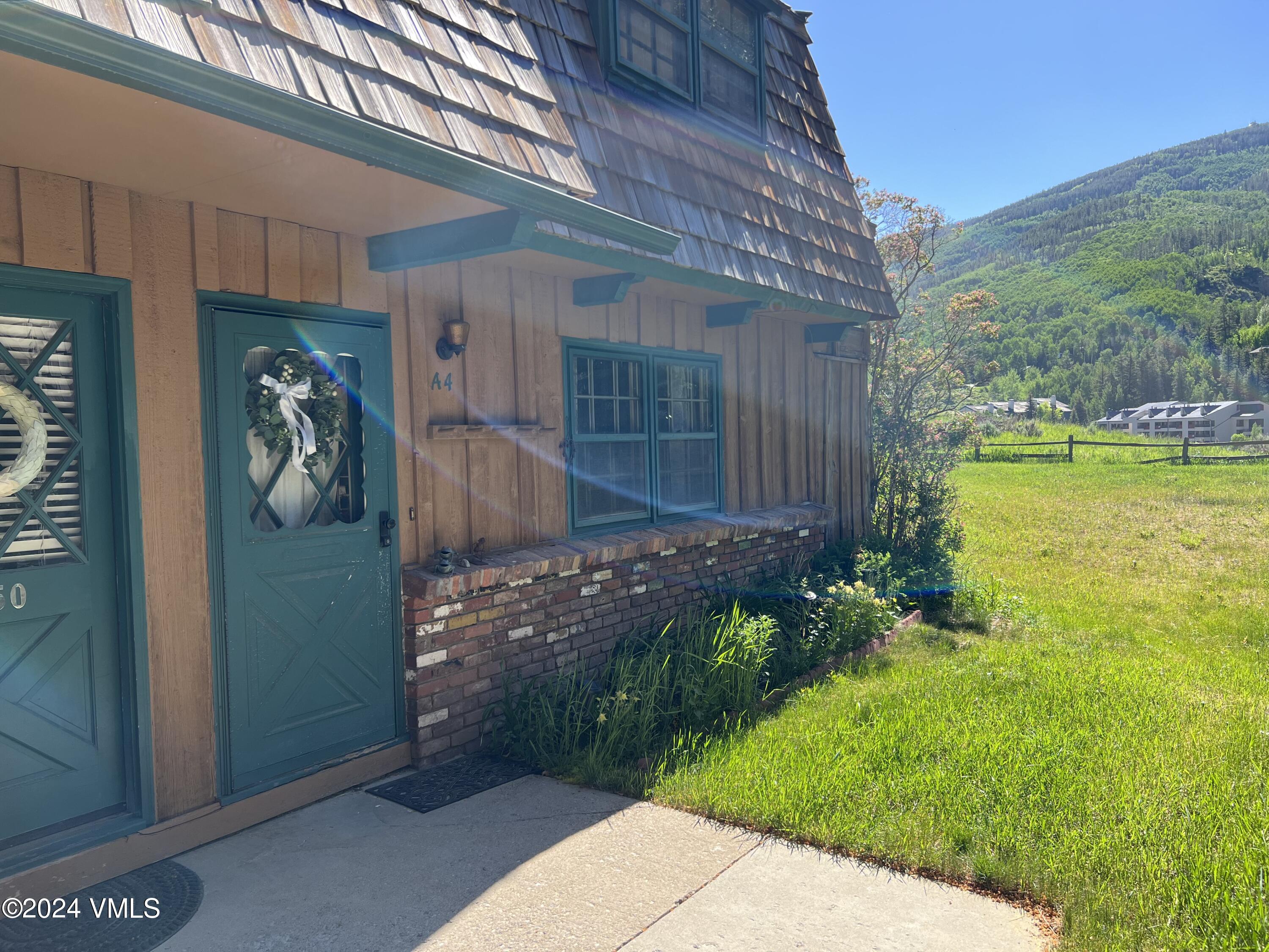 2450 Chamonix Lane, Unit 4 Vail, CO 81657 - Photo 6 of 7 a view of a backyard