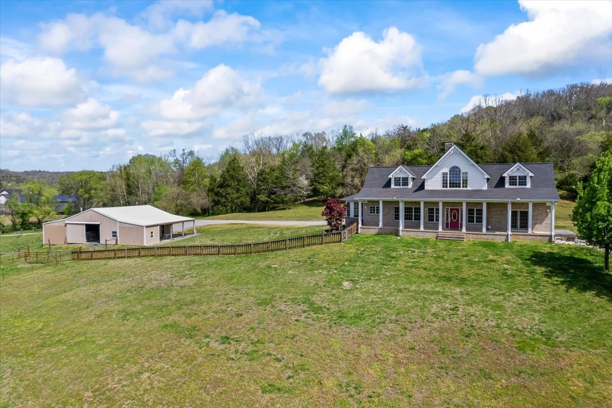 216 Old Wolf Hill Road Bethpage, TN 37022 - Photo 2 of 70 a view of a house with a big yard