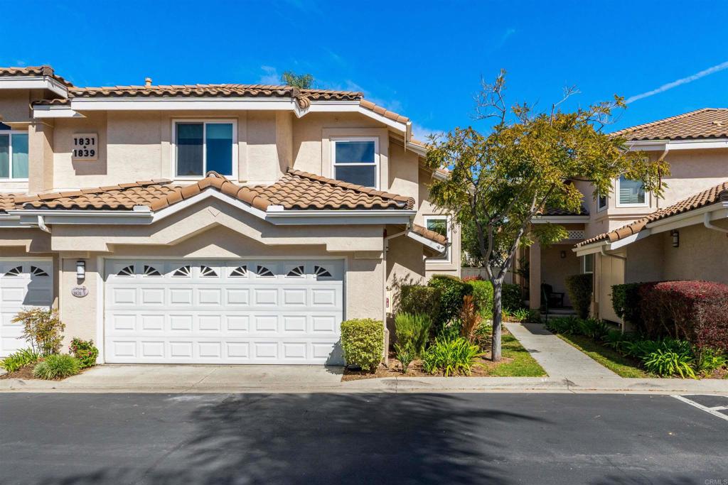 1831 Monserrat Way Vista, CA 92081 - Photo 1 of 46 a front view of a house with a yard