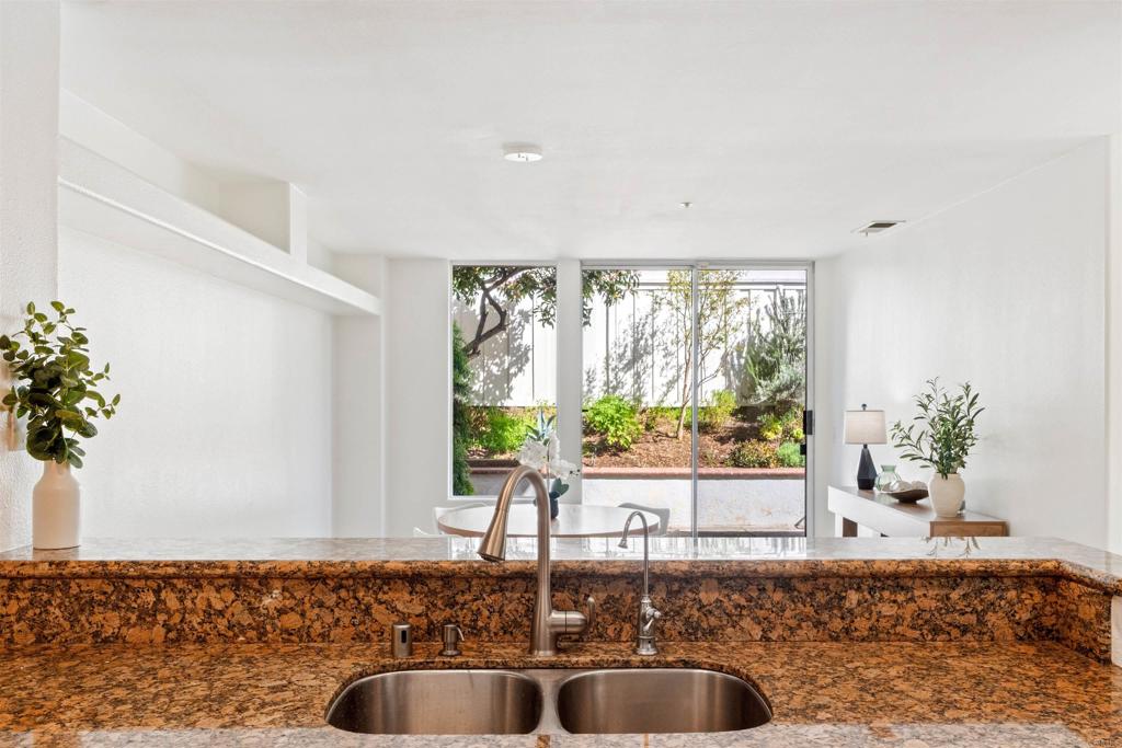 1831 Monserrat Way Vista, CA 92081 - Photo 15 of 46 a bathroom with a sink and a bathtub