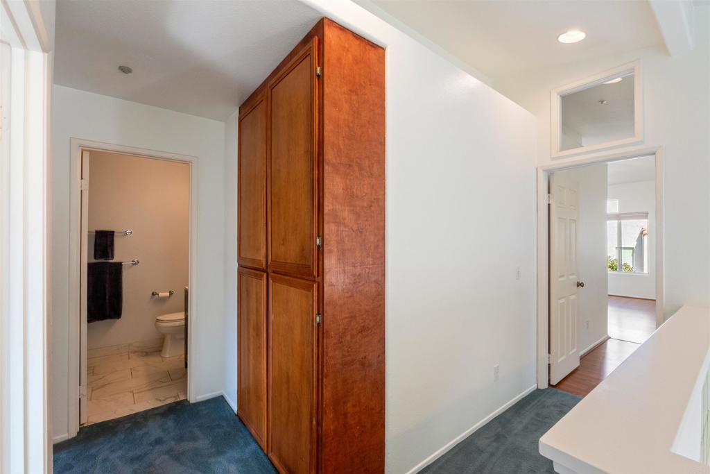 1831 Monserrat Way Vista, CA 92081 - Photo 27 of 46 a view of bathroom with a shower and a sink