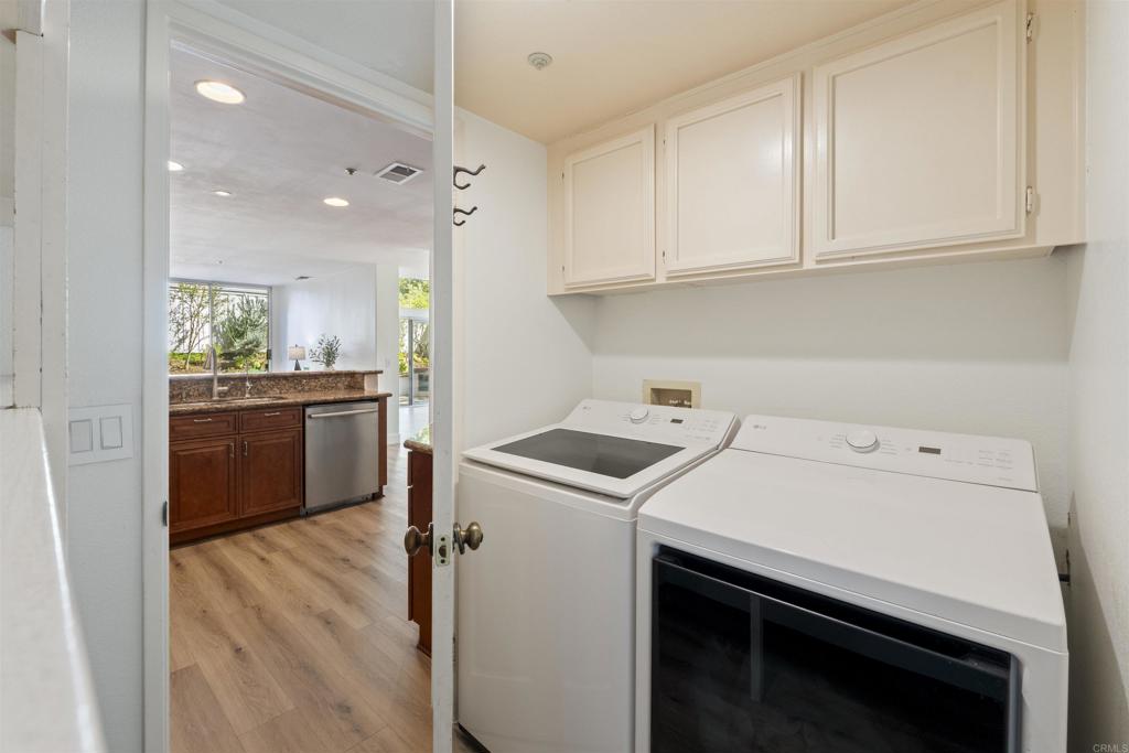 1831 Monserrat Way Vista, CA 92081 - Photo 32 of 46 a utility room with dryer and washer