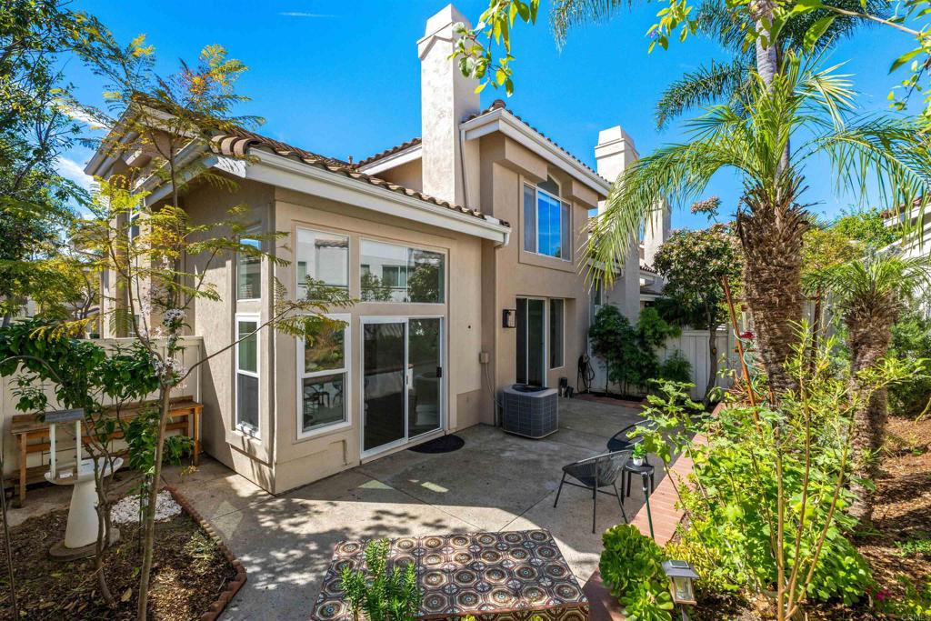 1831 Monserrat Way Vista, CA 92081 - Photo 34 of 46 front view of a house with a garden