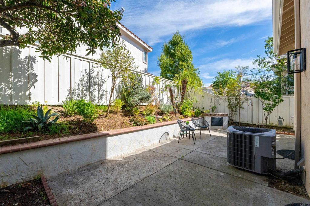 1831 Monserrat Way Vista, CA 92081 - Photo 36 of 46 a view of an outdoor sitting area with fire pit