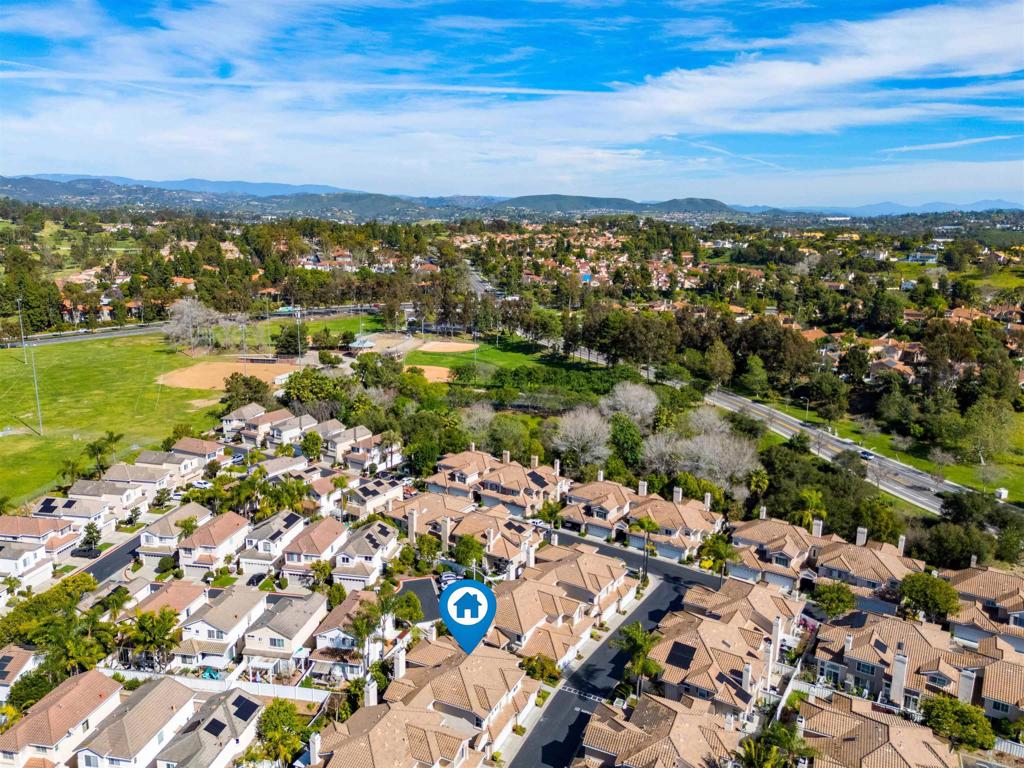 1831 Monserrat Way Vista, CA 92081 - Photo 39 of 46 an aerial view of a city