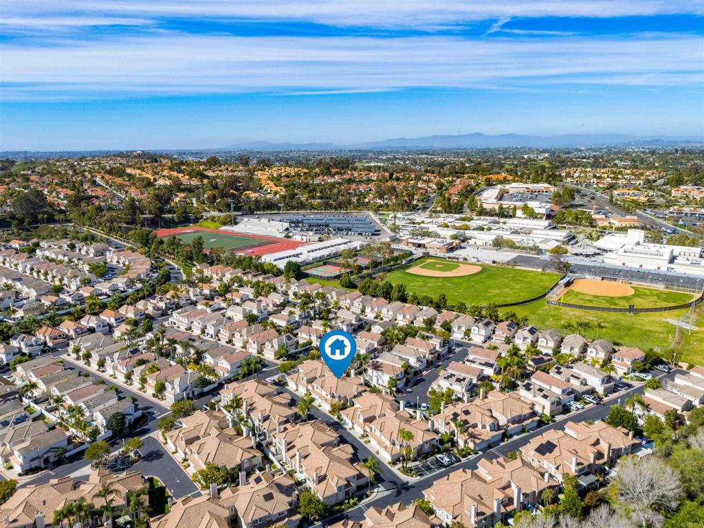 1831 Monserrat Way Vista, CA 92081 - Photo 42 of 46 a view of a city with an ocean