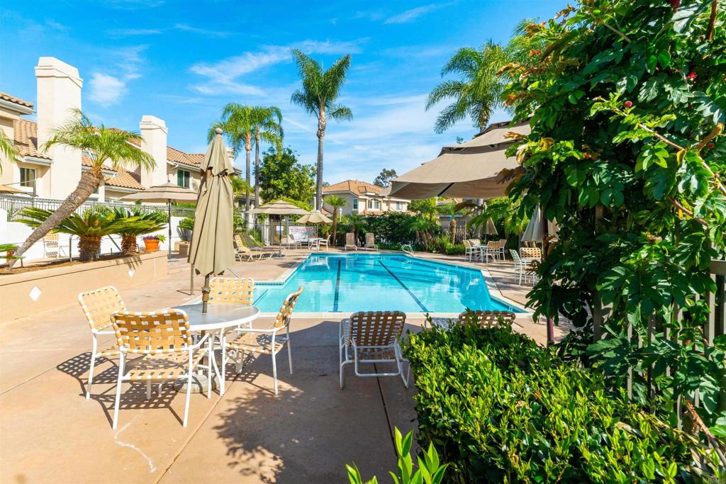1831 Monserrat Way Vista, CA 92081 - Photo 44 of 46 a view of a swimming pool with outdoor seating
