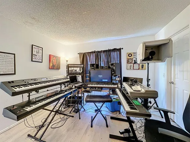 a room with furniture and a flat screen tv