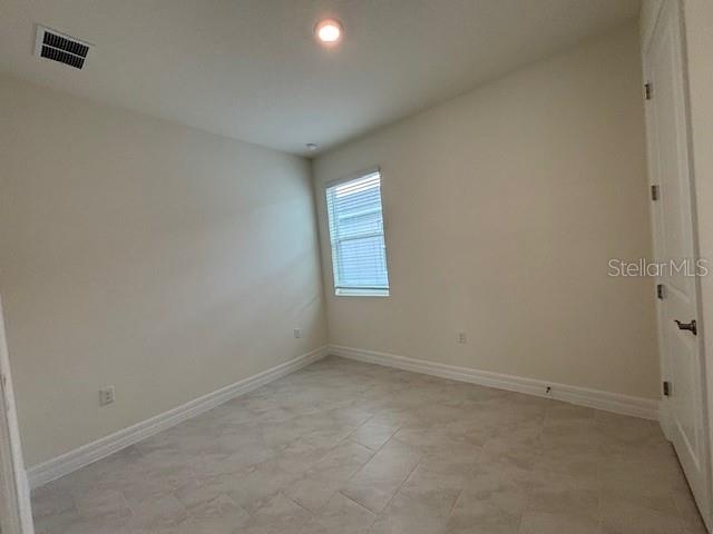 3969 Kennebunk Loop Mount Dora, FL 32757 - Photo 6 of 9 an empty room with a window
