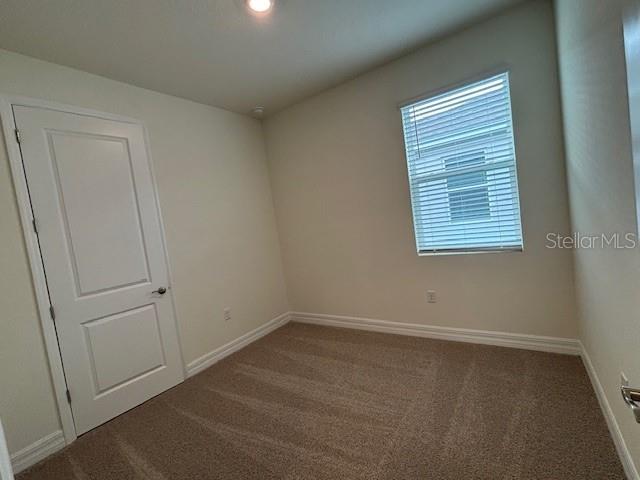3969 Kennebunk Loop Mount Dora, FL 32757 - Photo 7 of 9 an empty room with a window