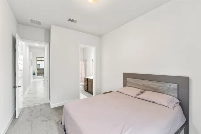 a bedroom with a bed and closet