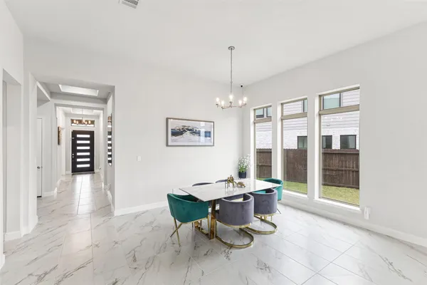 a living room with furniture and window