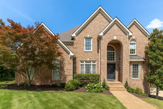 front view of house with a yard