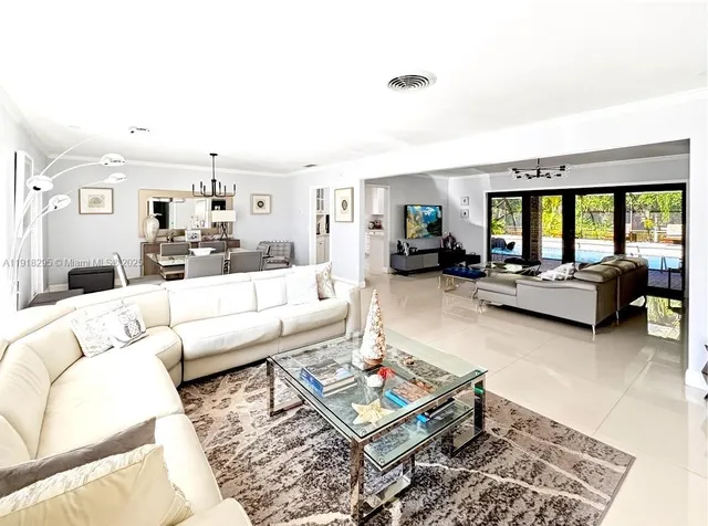 a living room with furniture and a table