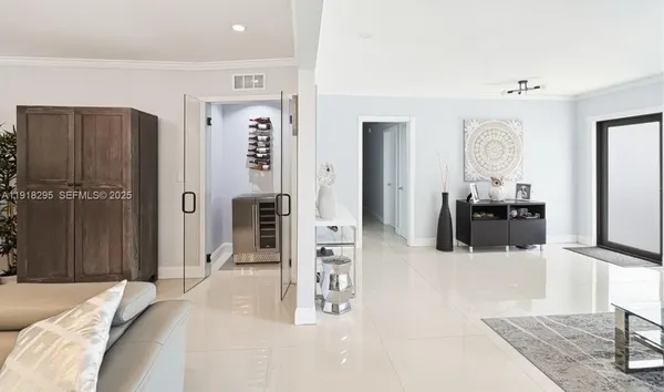 a view of an empty room with a fireplace