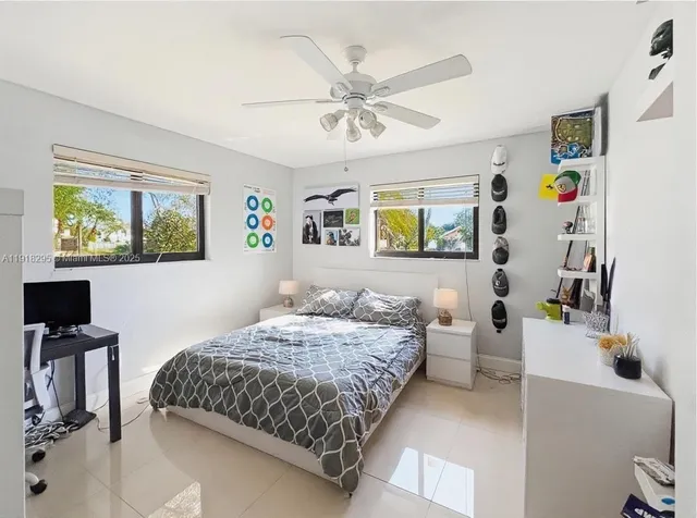 a bedroom with furniture and a bed