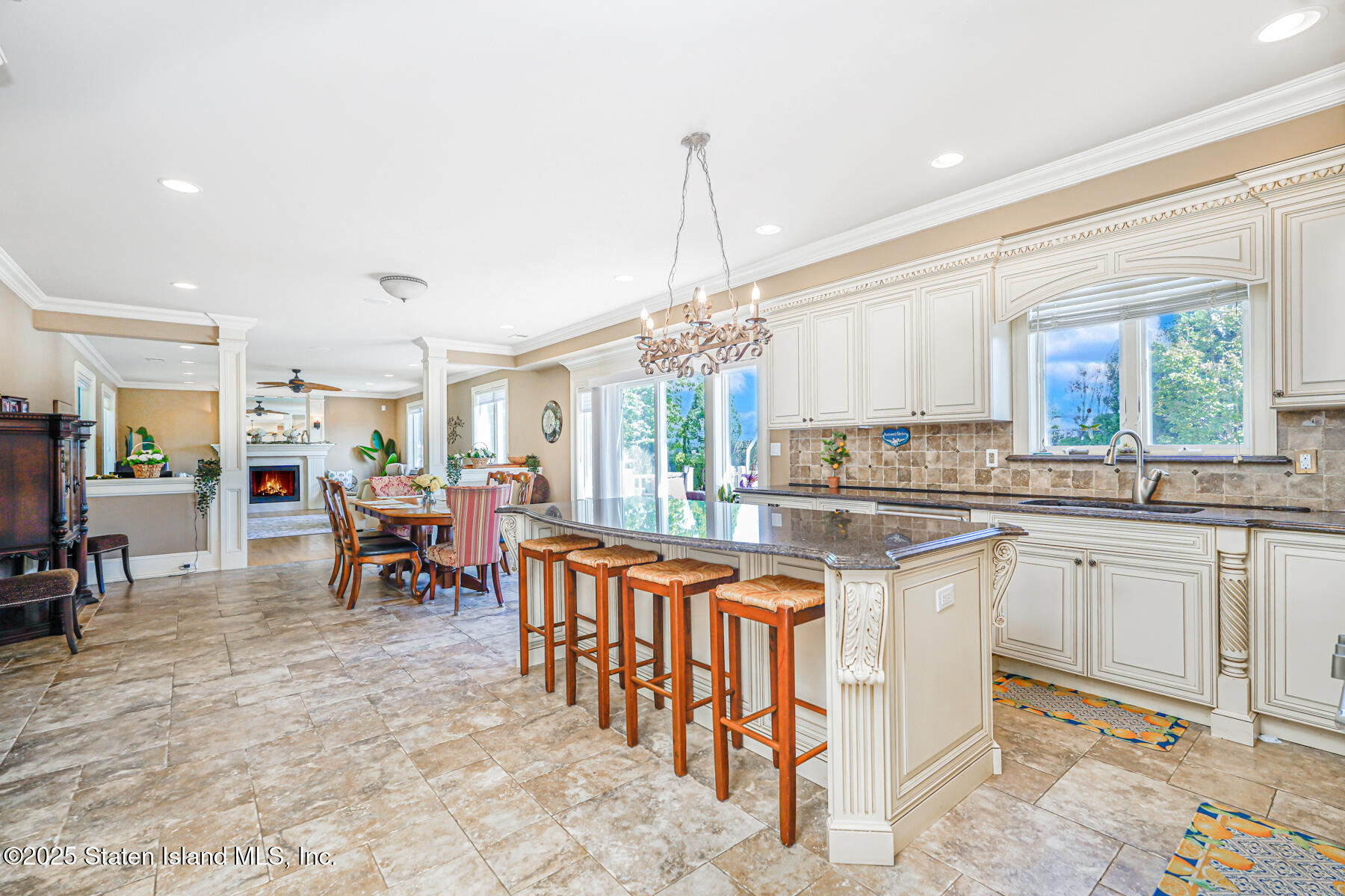 66 Normalee Road Staten Island, NY 10305 - Photo 15 of 54 a kitchen with lots of counter top space and dining table