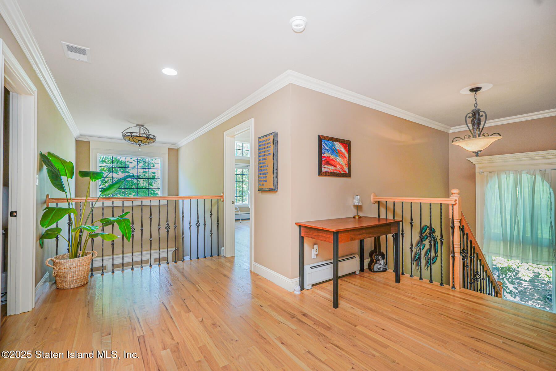 66 Normalee Road Staten Island, NY 10305 - Photo 25 of 54 a view of a furniture in wooden floor
