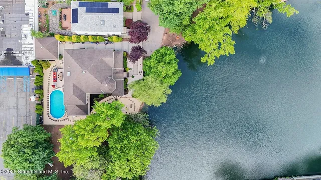 a bathroom with a tub and shower