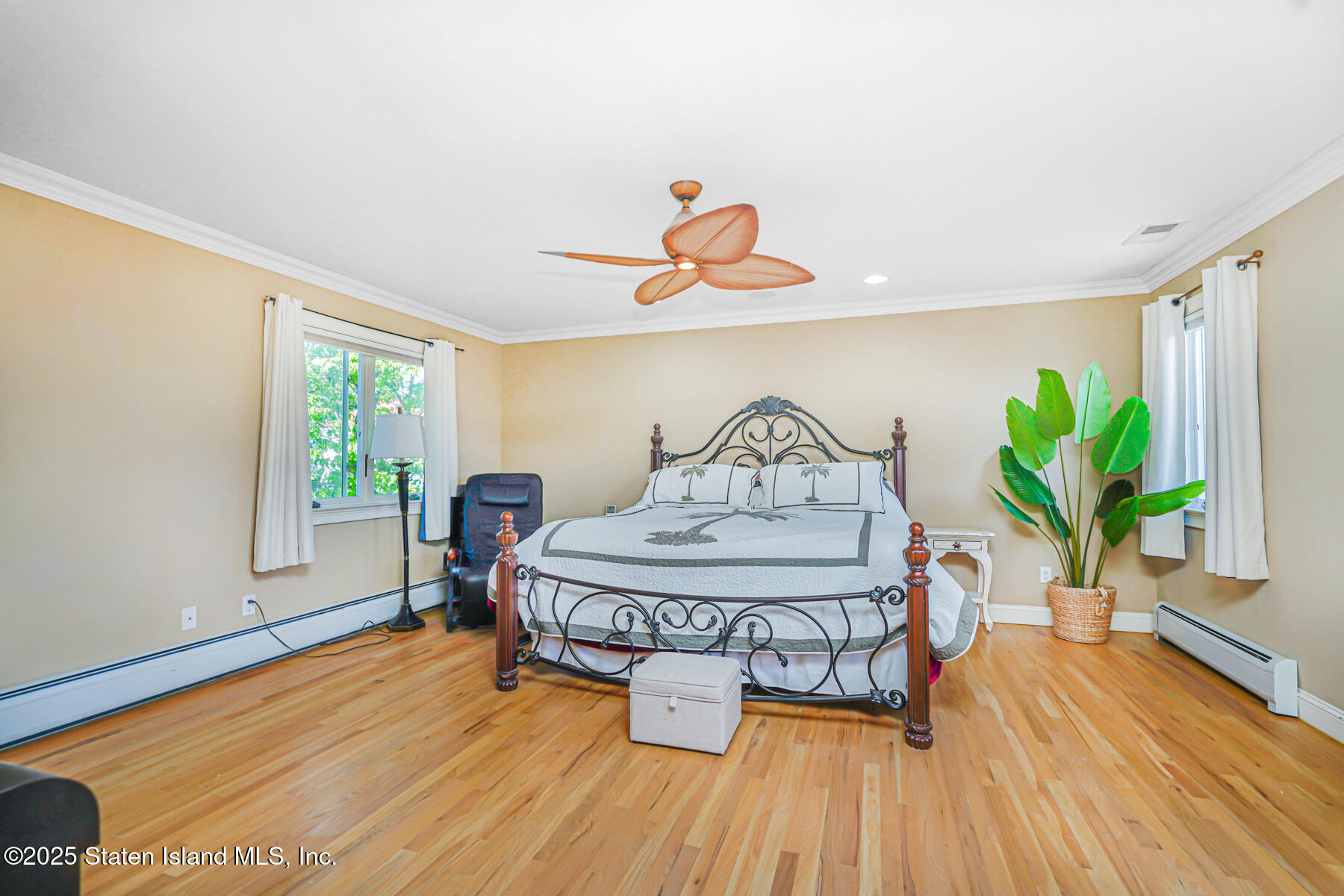66 Normalee Road Staten Island, NY 10305 - Photo 31 of 54 a view of a dining room with furniture window and wooden floor