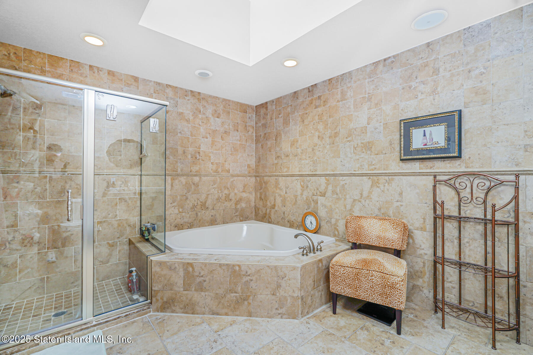 66 Normalee Road Staten Island, NY 10305 - Photo 33 of 54 a bathroom with a tub and shower