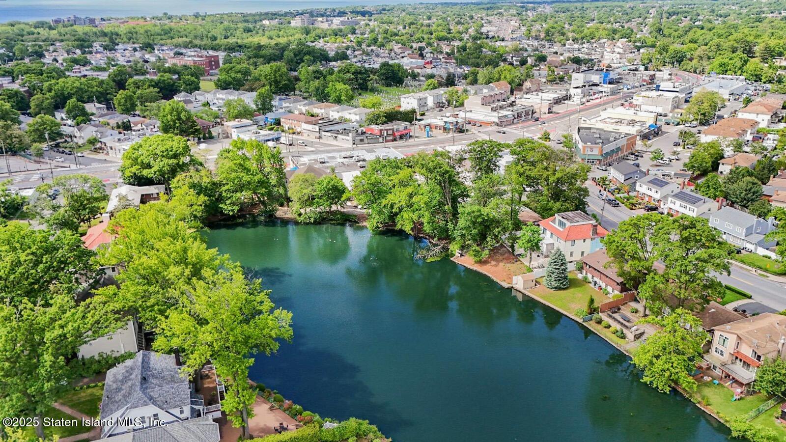 66 Normalee Road Staten Island, NY 10305 - Photo 52 of 54 a view of a lake with a city