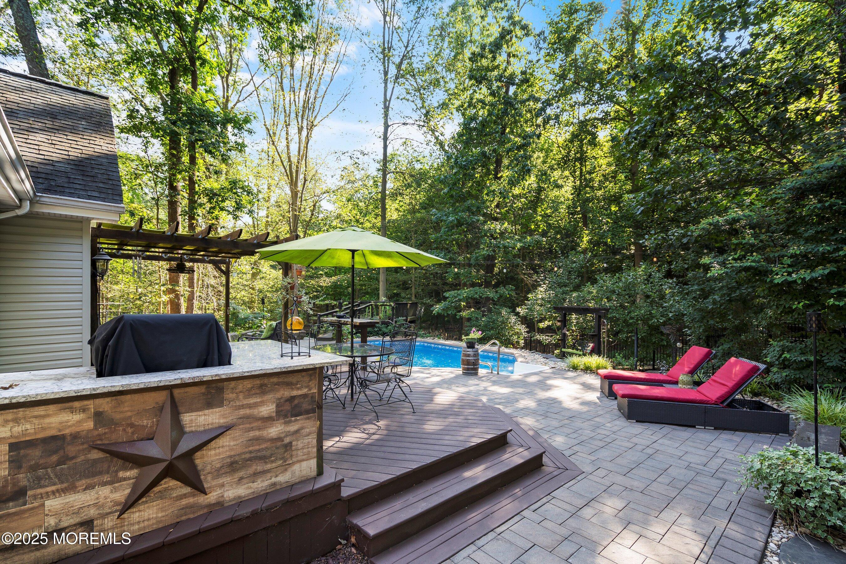 18 Rues Road Allentown, NJ 08501 - Photo 24 of 47 a backyard view with sitting space and trees