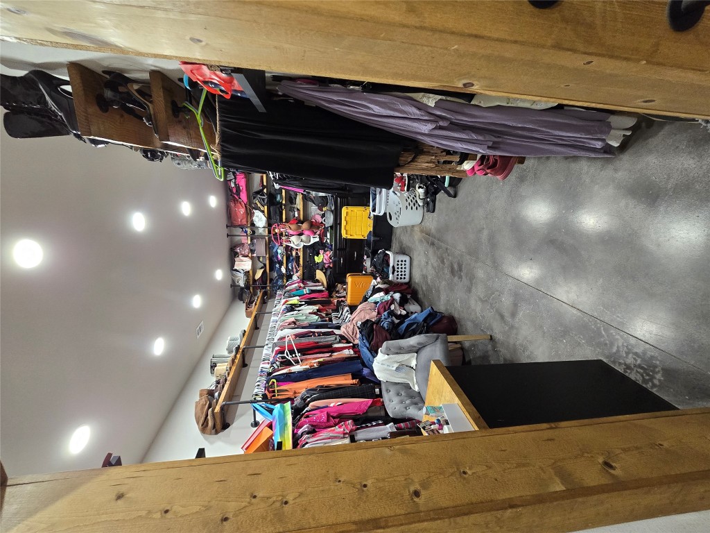 143 County Road Paige, TX 78659 - Photo 20 of 36 a view of a storage room with a couch