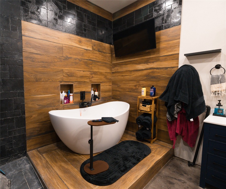 143 County Road Paige, TX 78659 - Photo 22 of 36 a bathroom with a sink and a mirror