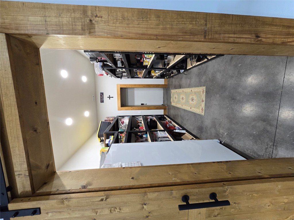 143 County Road Paige, TX 78659 - Photo 28 of 36 a view of walk in closet with clothes and shoes