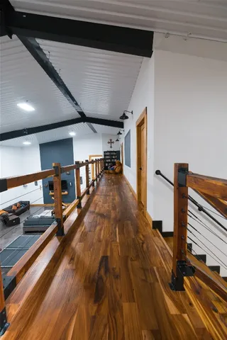 a bedroom with a bed and a table in it