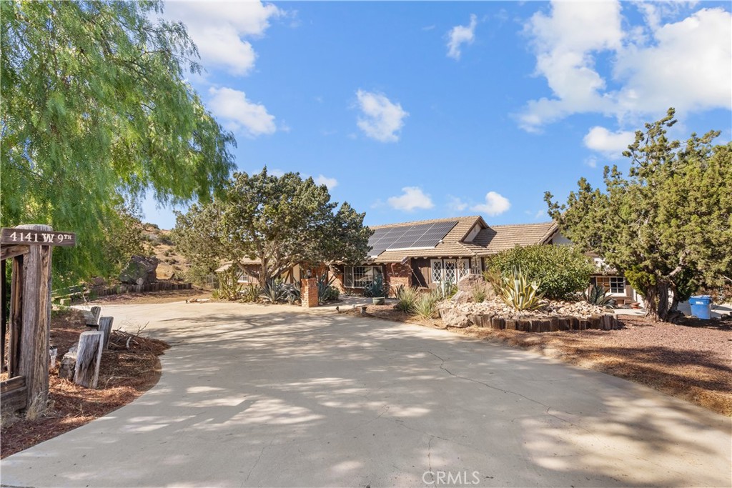 a view of road with a building in the background