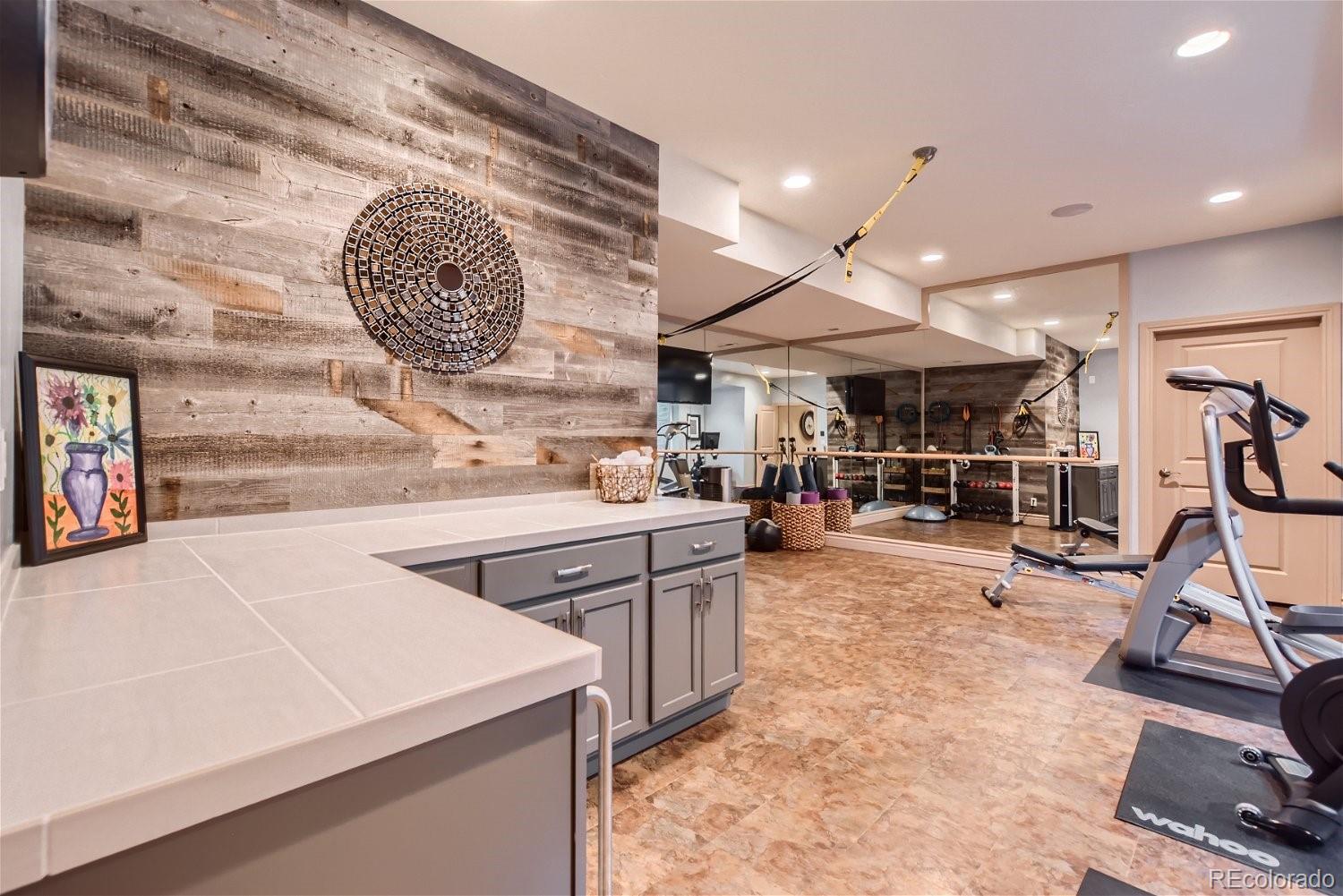 722 Skywalker Point Lafayette, CO 80026 - Photo 24 of 47 a view of a room with gym equipment