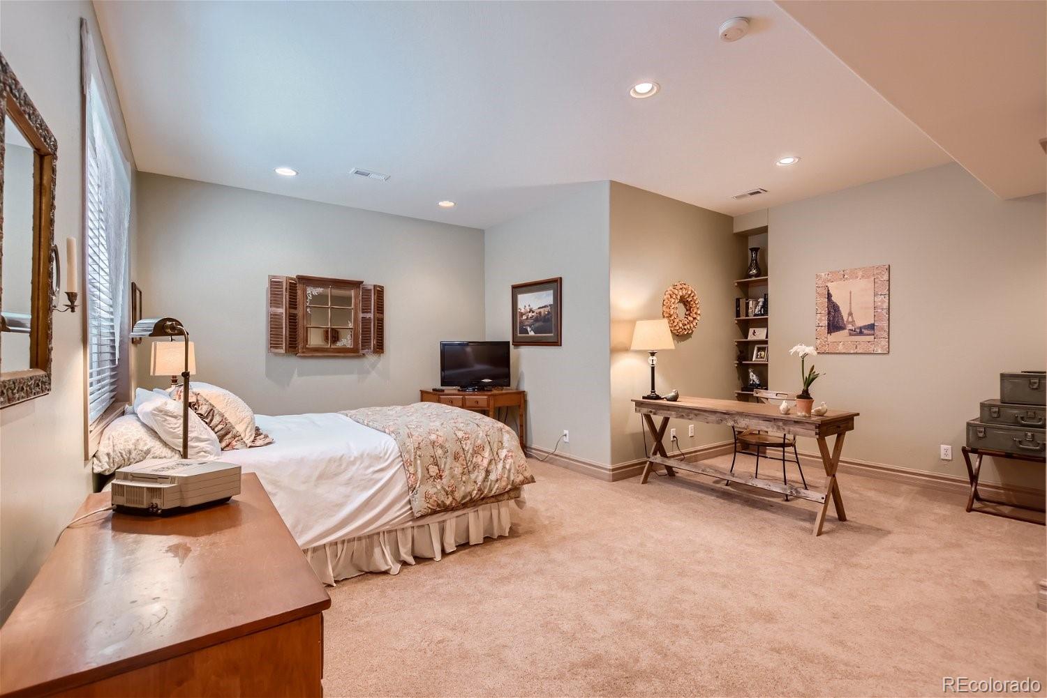 722 Skywalker Point Lafayette, CO 80026 - Photo 27 of 47 a living room with furniture and a wooden floor