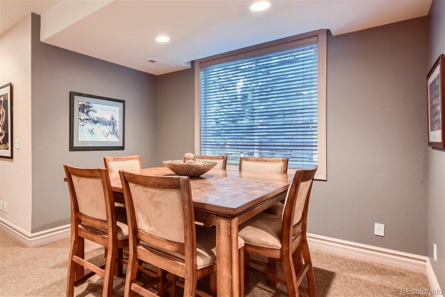 722 Skywalker Point Lafayette, CO 80026 - Photo 30 of 47 a view of a dining room with furniture and window