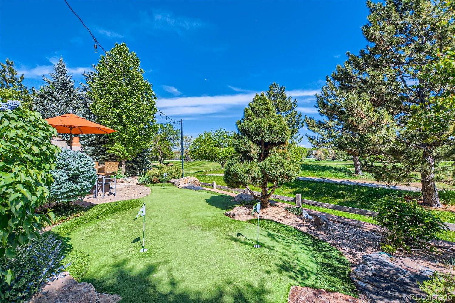 722 Skywalker Point Lafayette, CO 80026 - Photo 36 of 47 a view of a garden with a tree