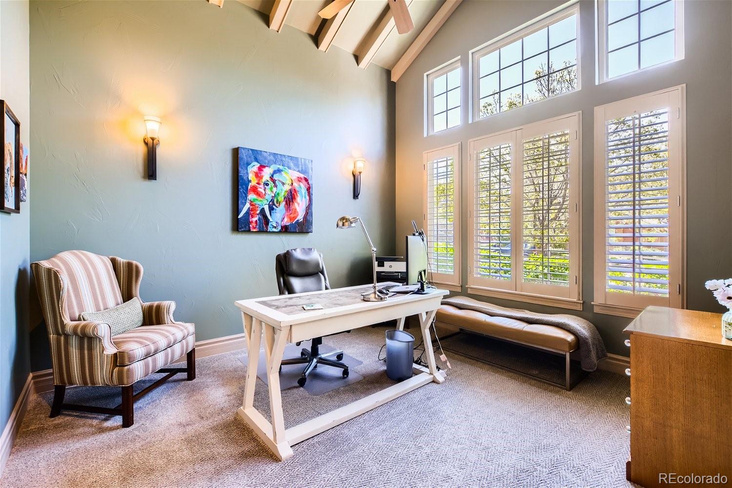 722 Skywalker Point Lafayette, CO 80026 - Photo 8 of 47 a living room with furniture and a large window