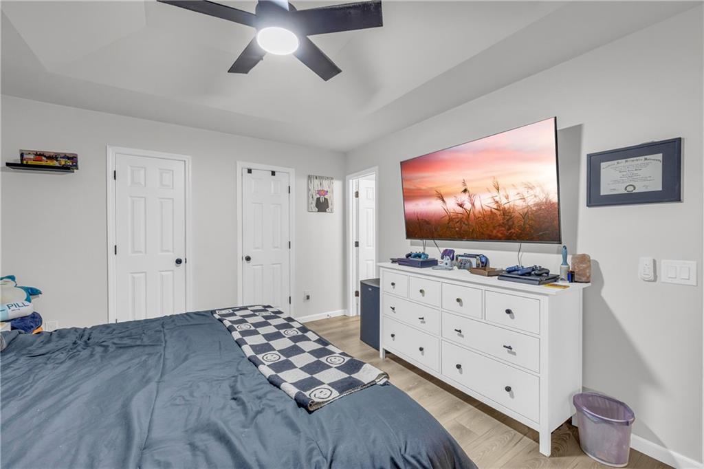 624 Red Fox Lane Auburn, GA 30011 - Photo 14 of 28 a living room with furniture and a flat screen tv
