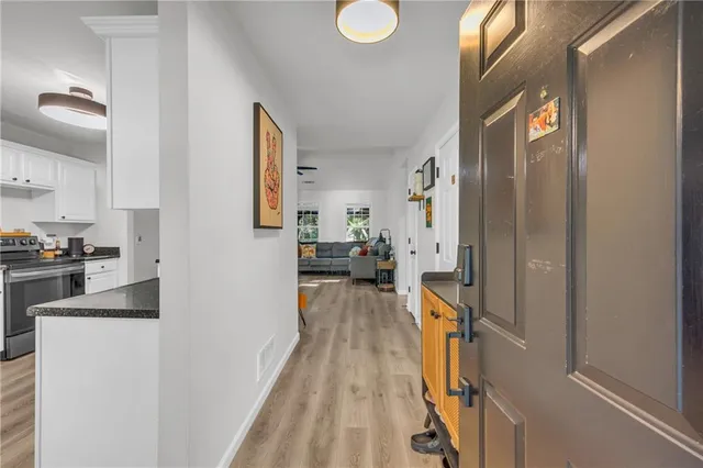 a view of a living room and a kitchen