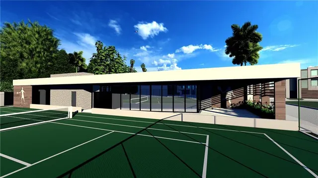 a view of the house with a swimming pool