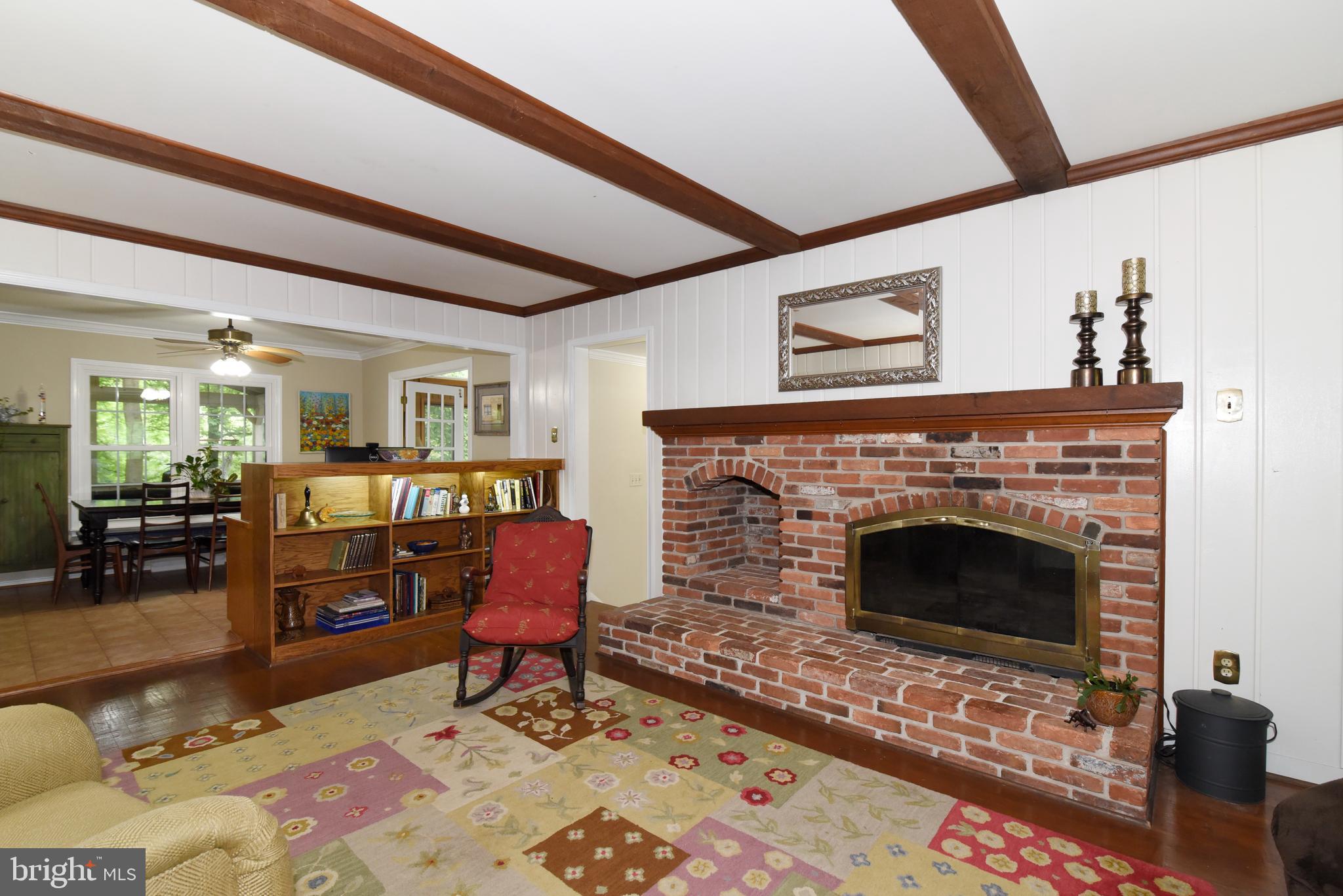 1718 Saddle Ridge Court Vienna, VA 22182 - Photo 13 of 45 Family room with wood burning fireplace