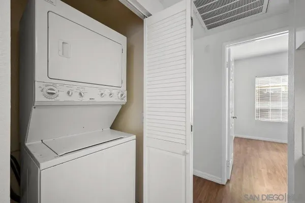 a view of bathroom with washer and dryer